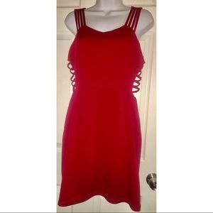 Fitted red dress with side slits